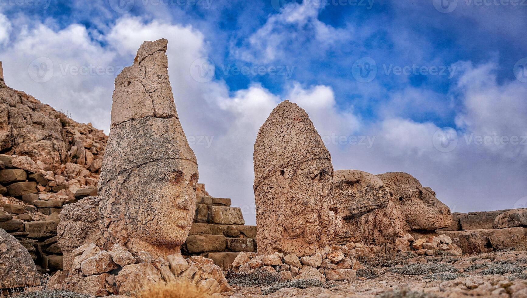 Antique ruined statues on Nemrut mountain in Turkey. ancient Kingdom of Commagene in south east Turkey. photo