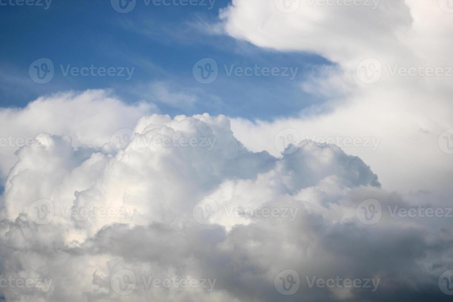 a large cloud that is in the sky. cumulus clouds. cumulonimbus photo