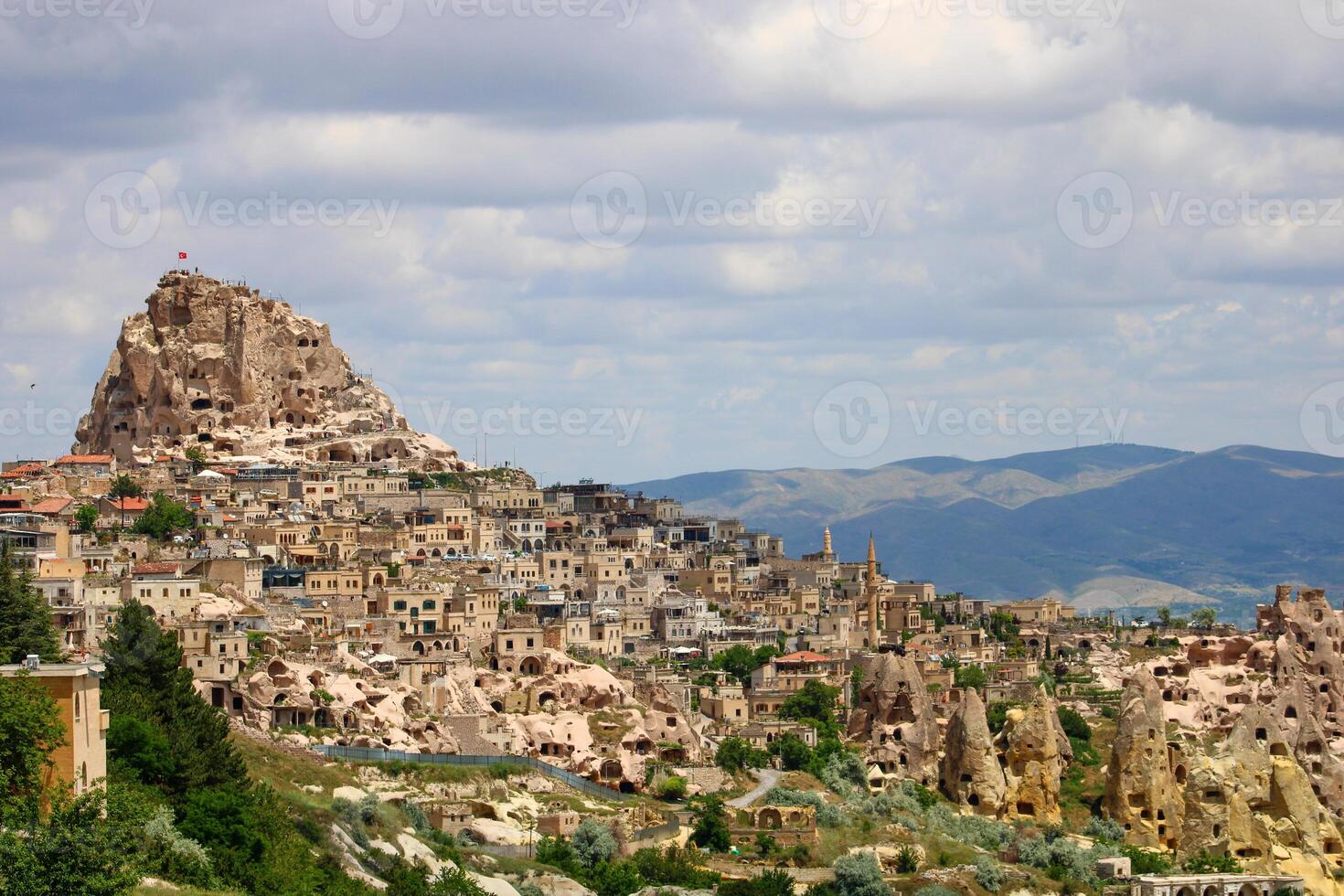 Cappadocia Uchisar Castle is a magnificent view at sunset. Nevsehir,Turkey. photo