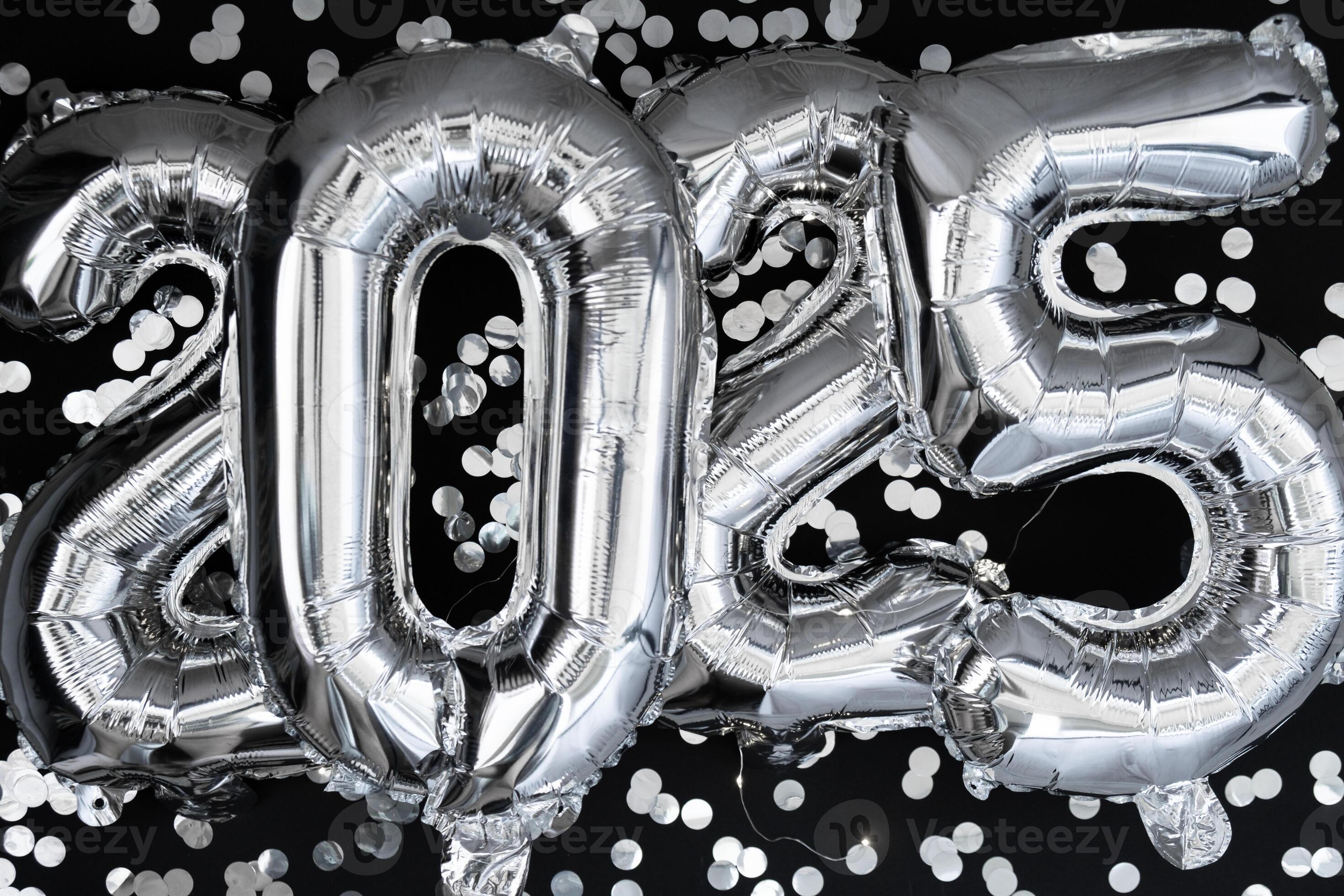 Happy New Year 2025 Metallic Balloons With Confetti On Dark Black Happy New Year 2025 Metallic Balloons With Confetti On Dark Black Background Greeting Card Silver Foil Balloons Numbers Christmas Holiday Concept Celebration Party Congratulation Decoration Photo