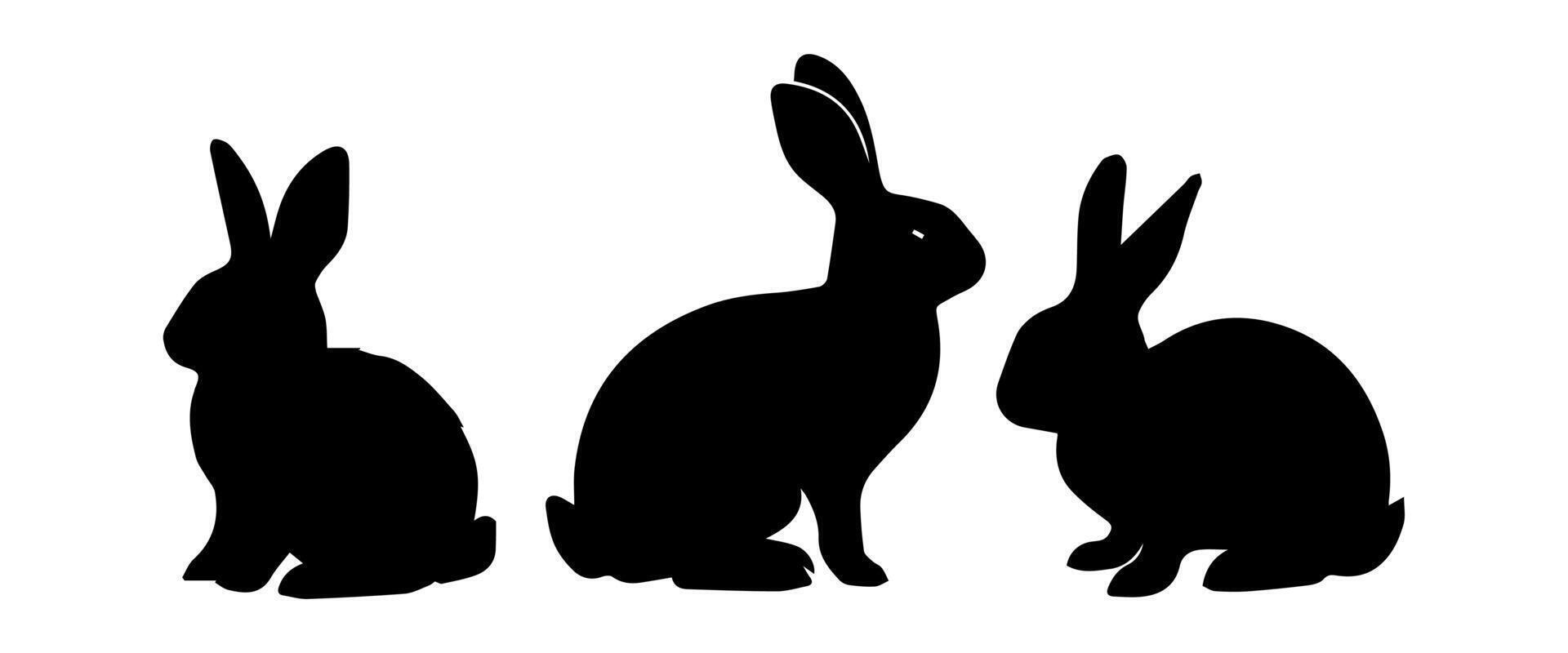 Silhouettes of easter bunnies isolated on a white background. Set of different rabbits silhouettes vector