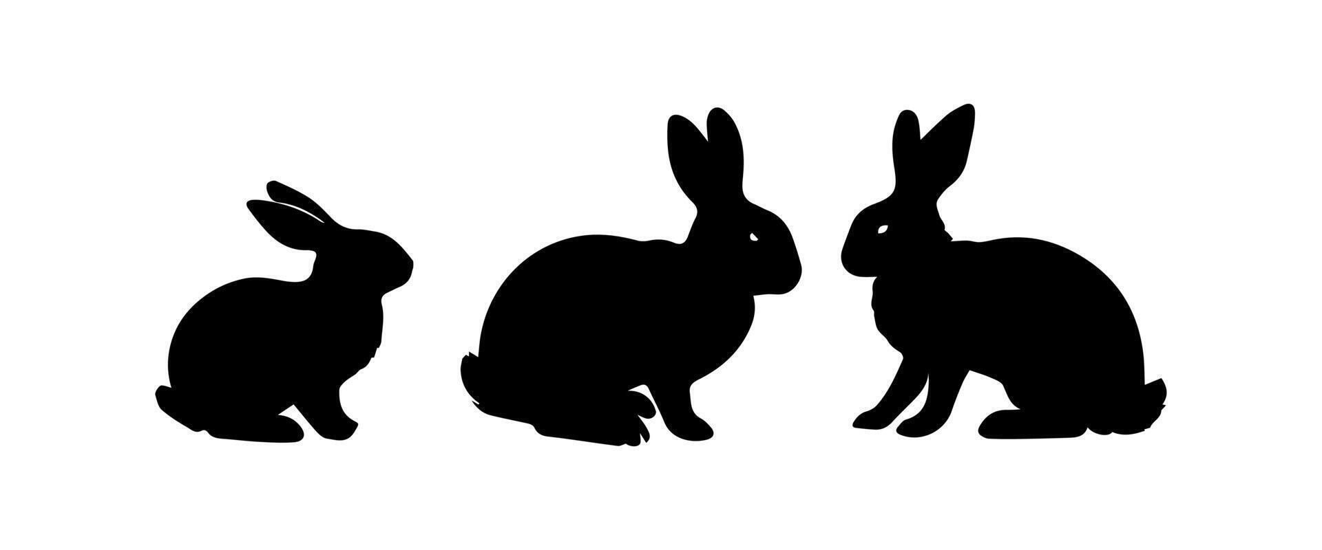 Silhouettes of easter bunnies isolated on a white background. Set of different rabbits silhouettes vector