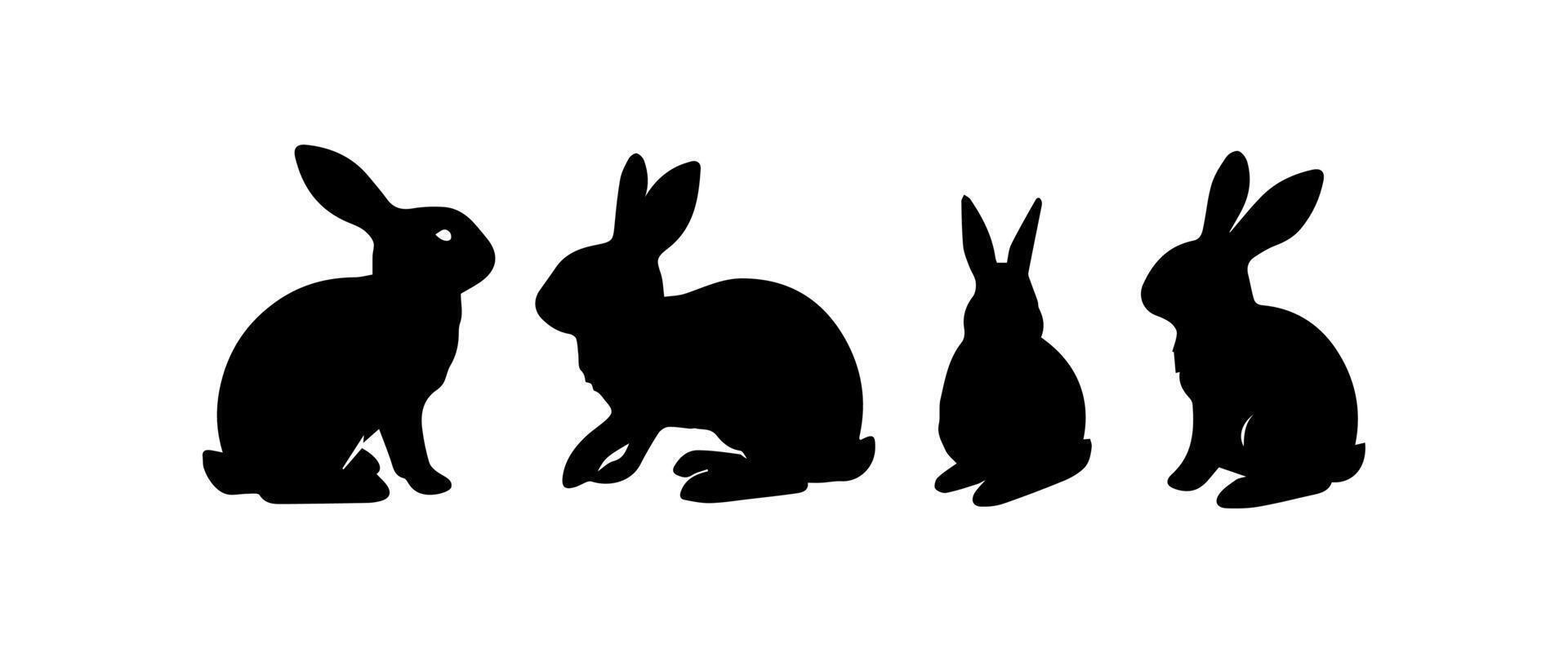 Silhouettes of easter bunnies isolated on a white background. Set of different rabbits silhouettes vector