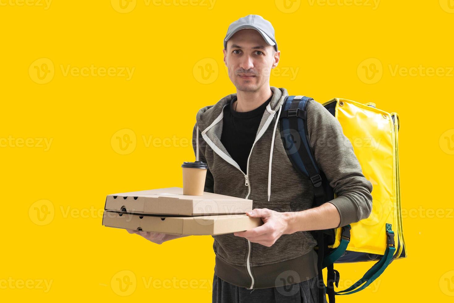 Young handsome man holding delivery paper bag photo