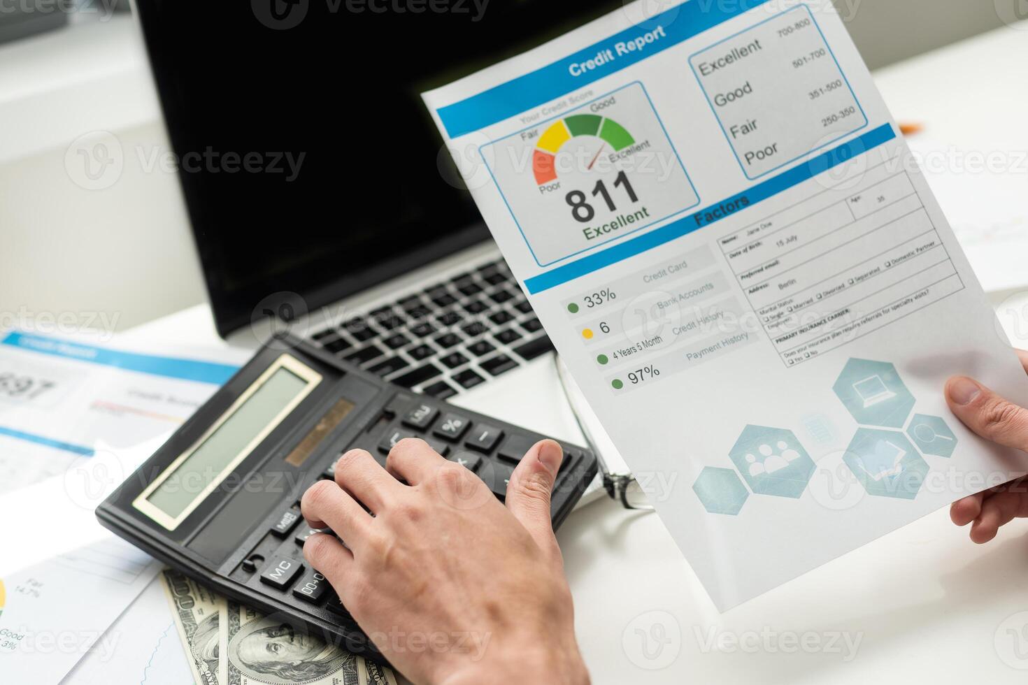 The man checks the credit report and how many credit points. photo