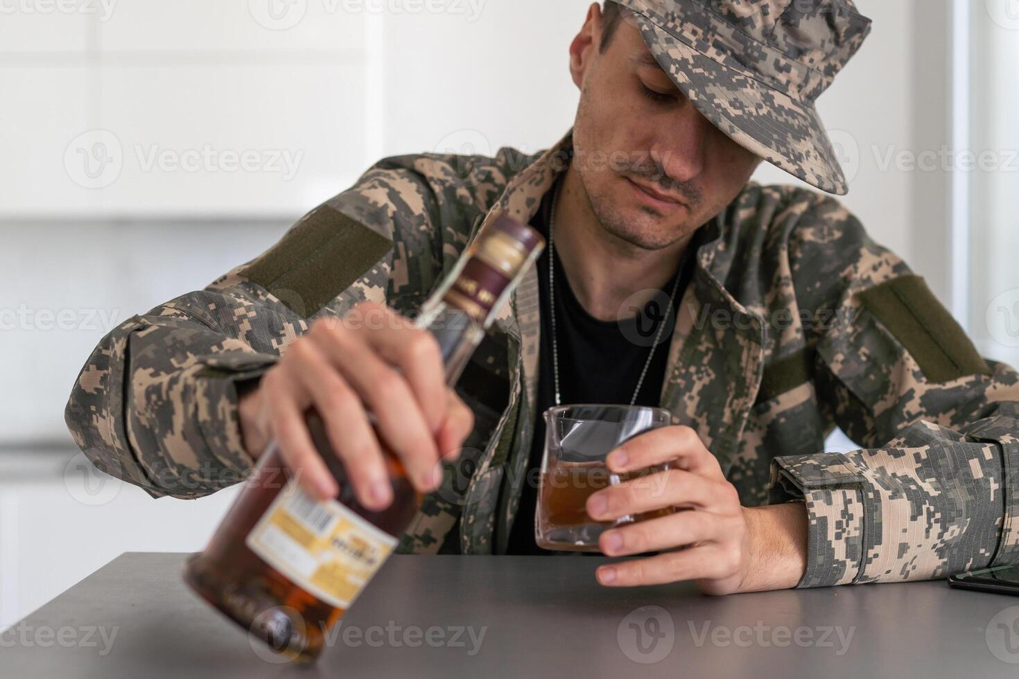one man sit at home with bottle of liquor drink whiskey drunk alcoholic Alcohol abuse, addiction and man depression concept drink and drive copy space hold car keys photo