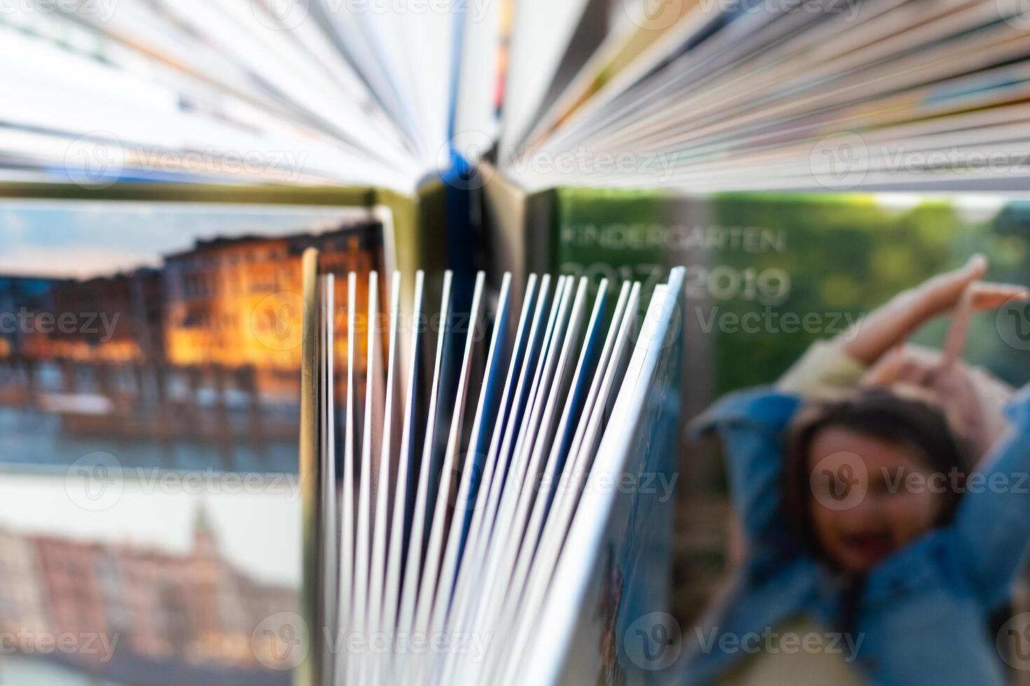 Books. A lot of books with bright covers in one pile isolated on white background. Design element, paper and leather texture. Colorful books on the shelf, close up photo