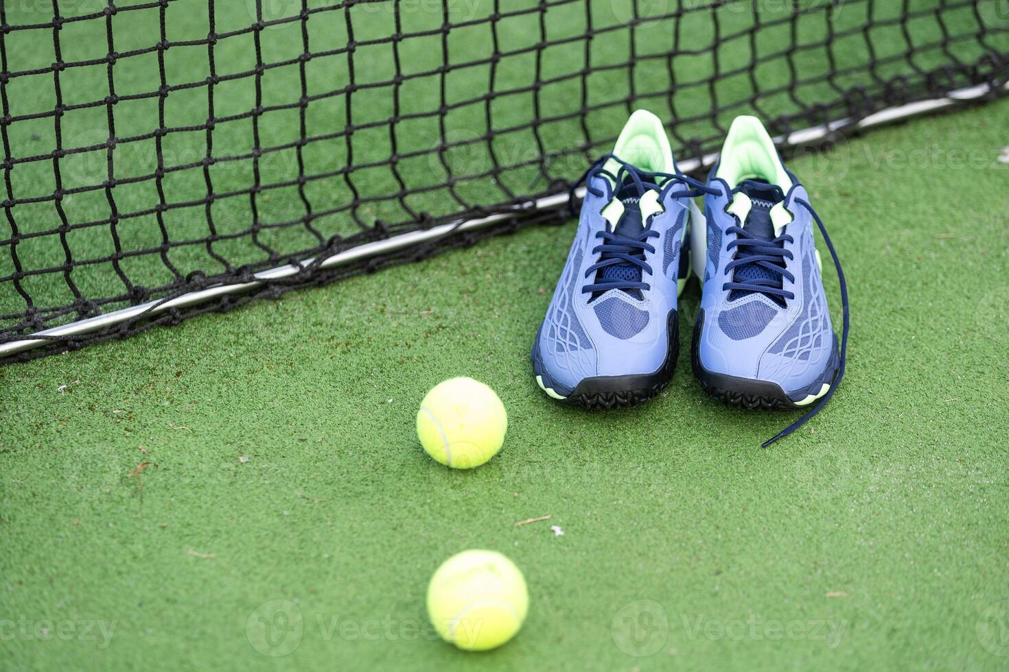 Paddle tennis and artificial grass, close up image photo