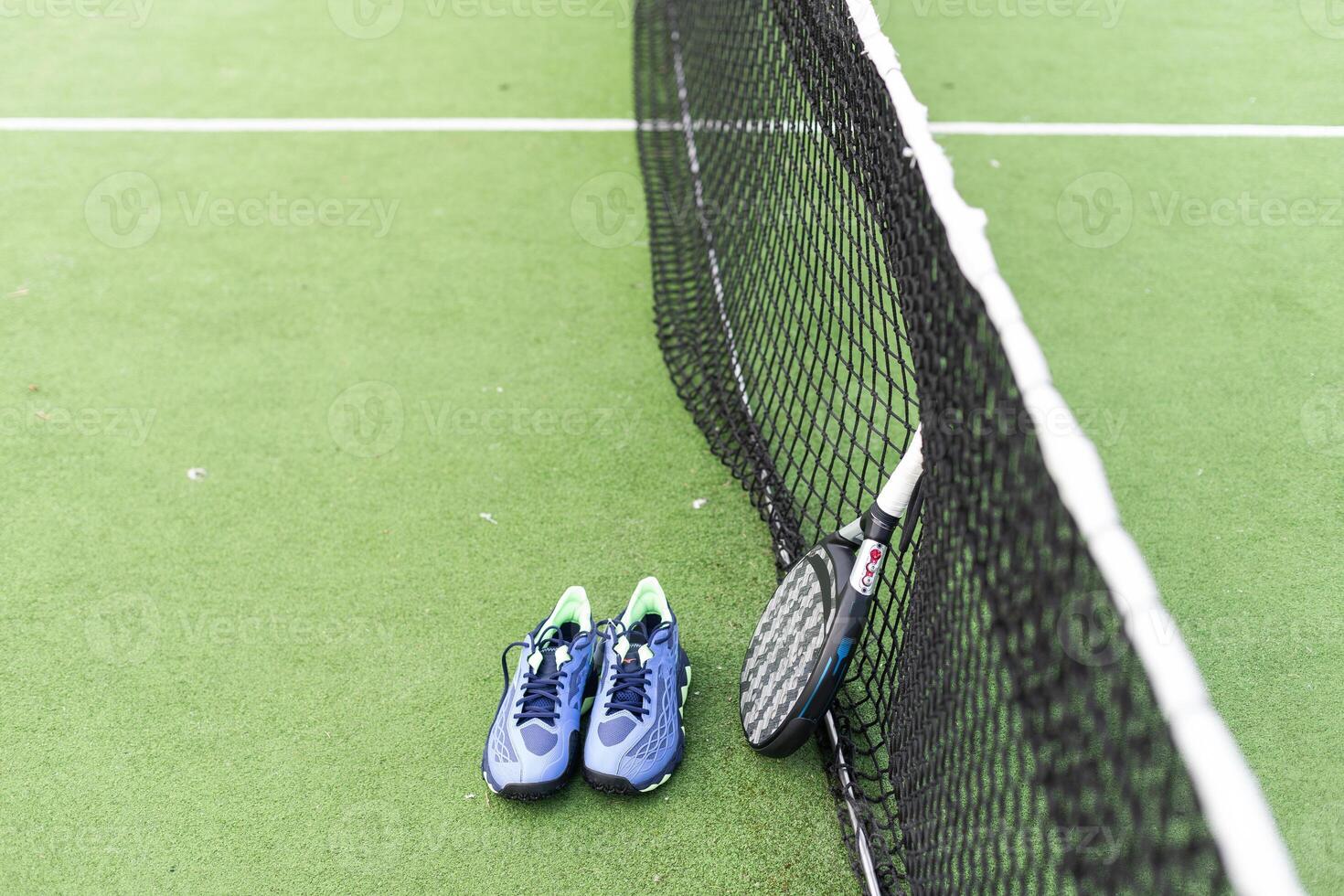 Padel tennis racket sport court and balls. Download a high quality photo with paddle for the design of a sports app or soical media advertisement