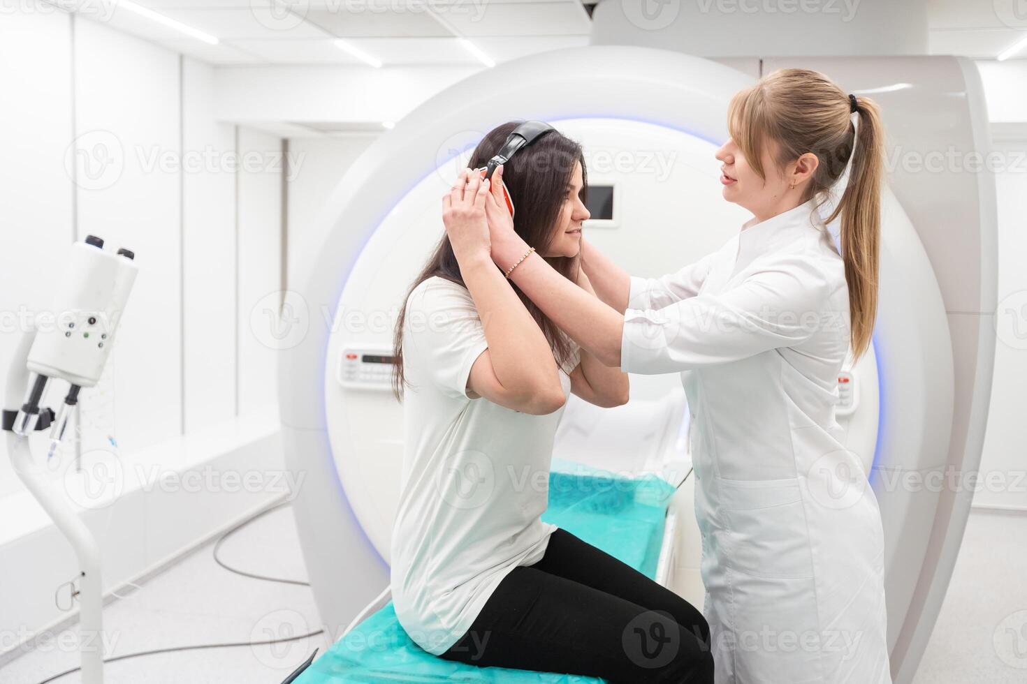 Medical CT or MRI Scan with a patient in the modern hospital laboratory. Interior of radiography department. Technologically advanced equipment in white room. Magnetic resonance diagnostics machine photo
