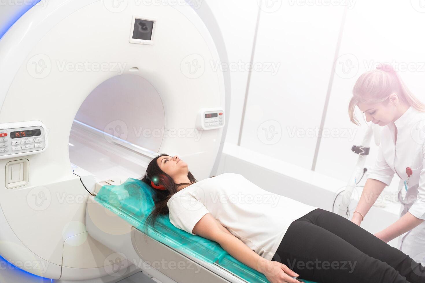 Medical CT or MRI Scan in the modern hospital laboratory. Interior of radiography department. Technologically advanced equipment in white room. Magnetic resonance diagnostics machine photo
