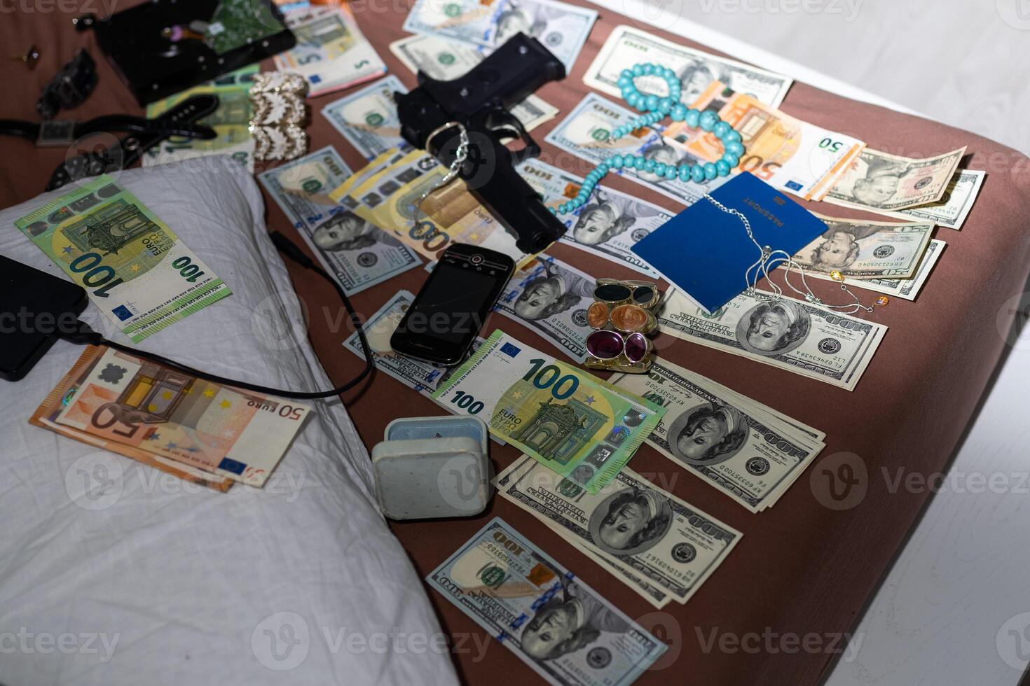 Checking counterfeit money with an ultraviolet lamp. Polish zloty photo
