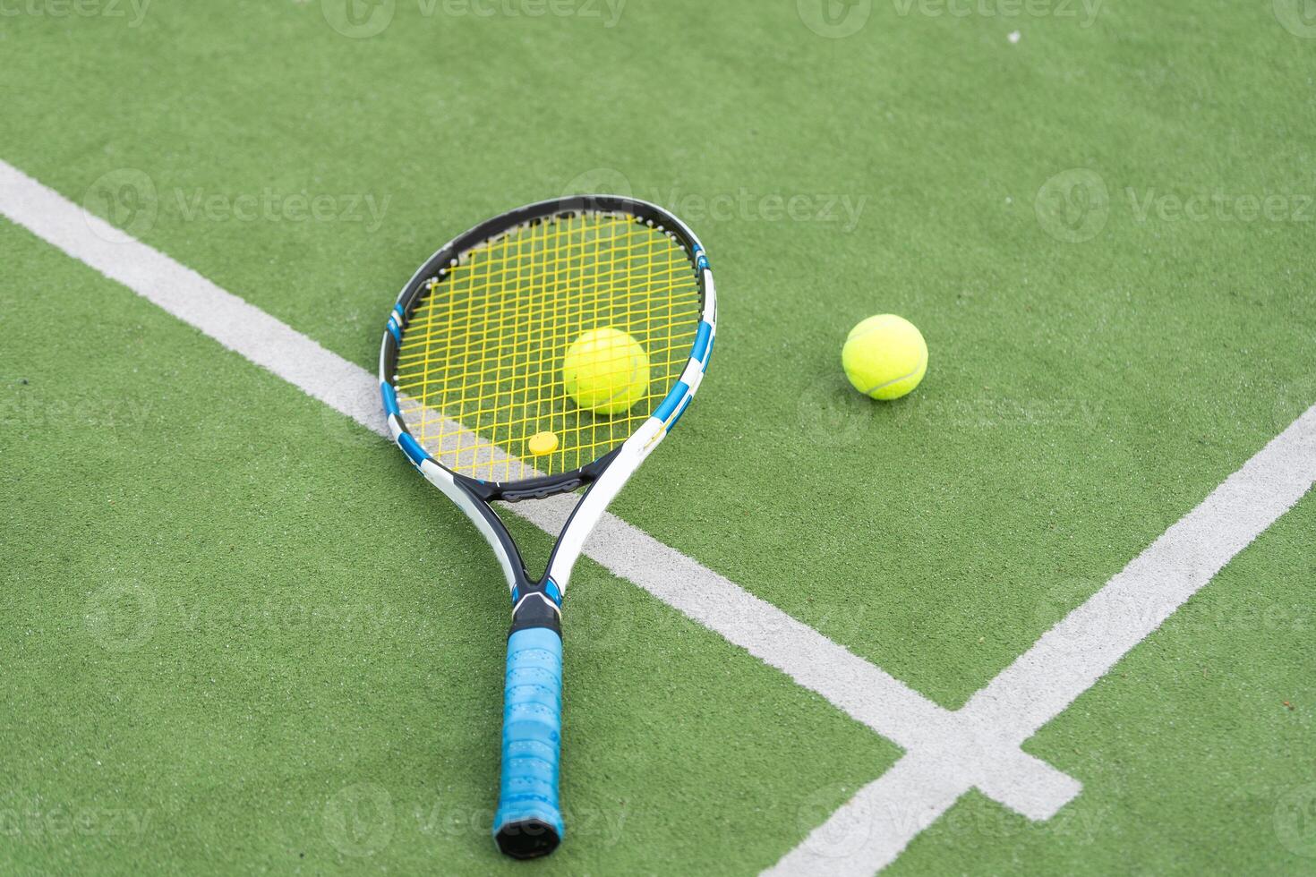Tennis Court with ball and racket photo