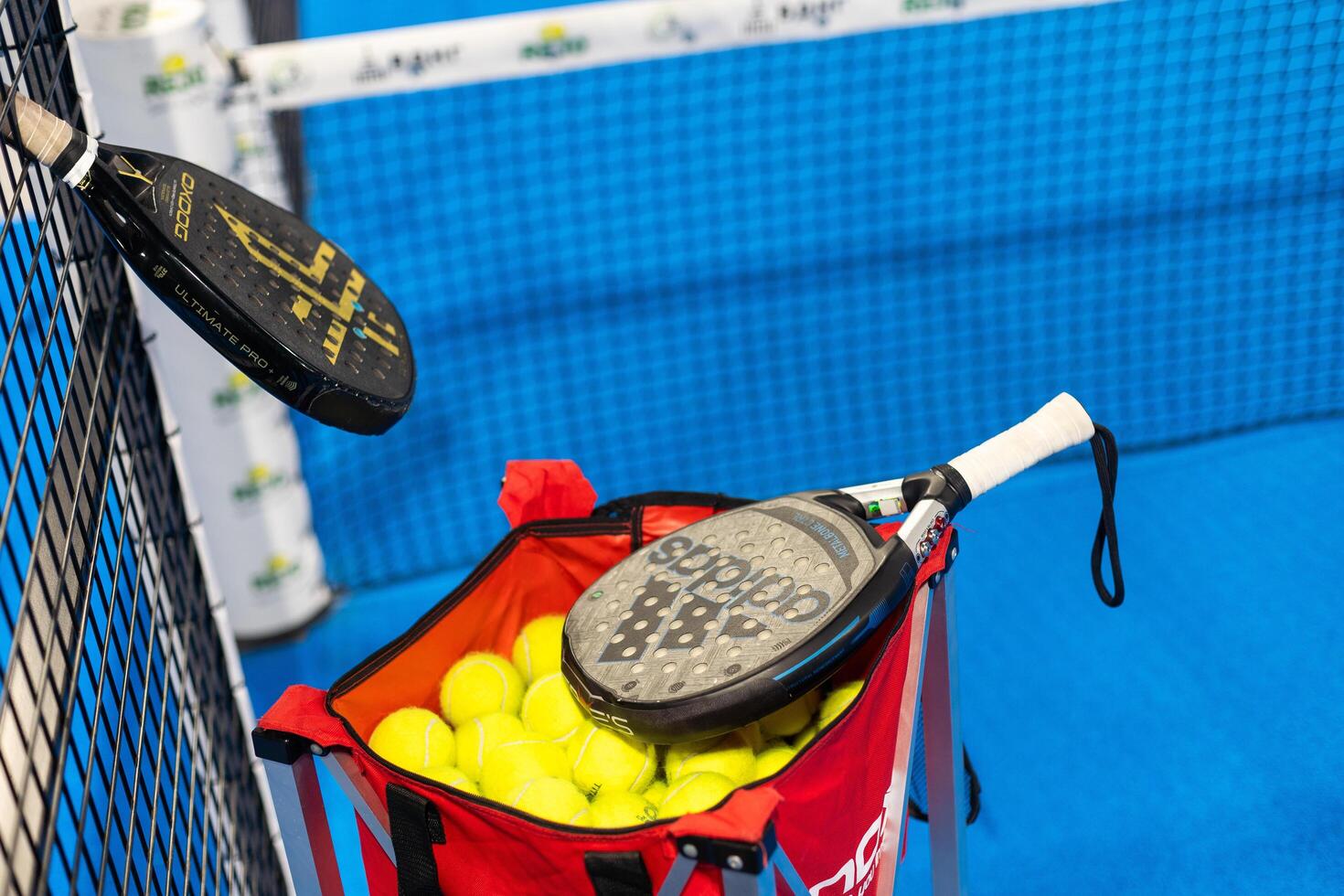 Kyiv, Ukraine. March 22, 2024, Paddle tennis rackets on the court photo