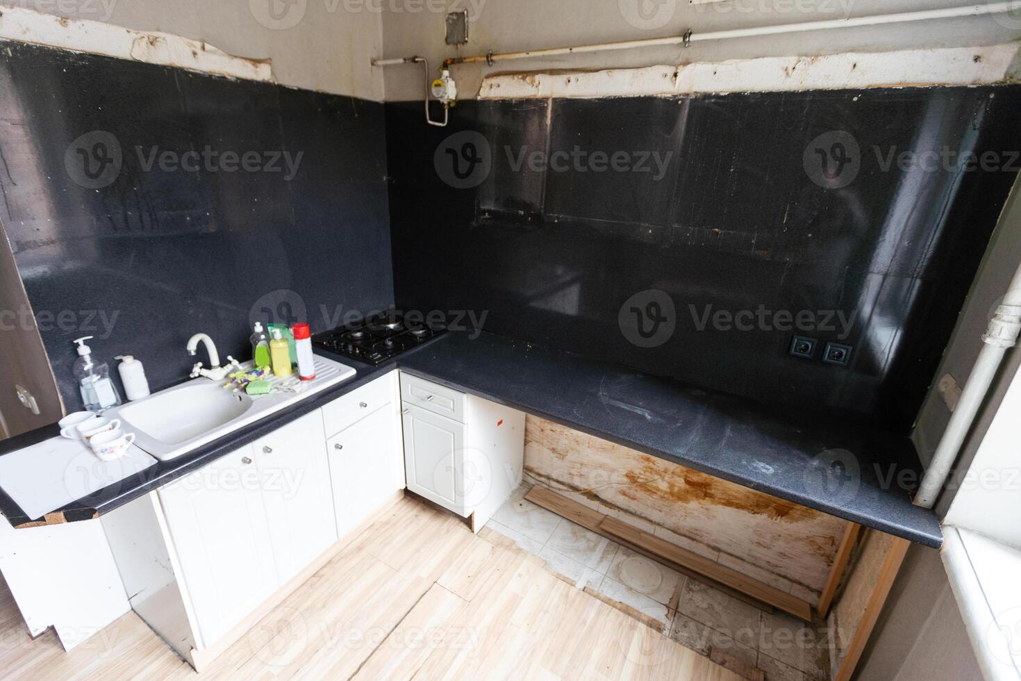 an old style kitchen room with white tiled walls photo