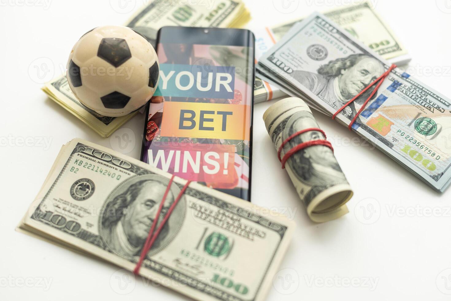 tablet pc with app for sport bets, on top of stacks of banknotes, white background, concept of online bets 3d render photo