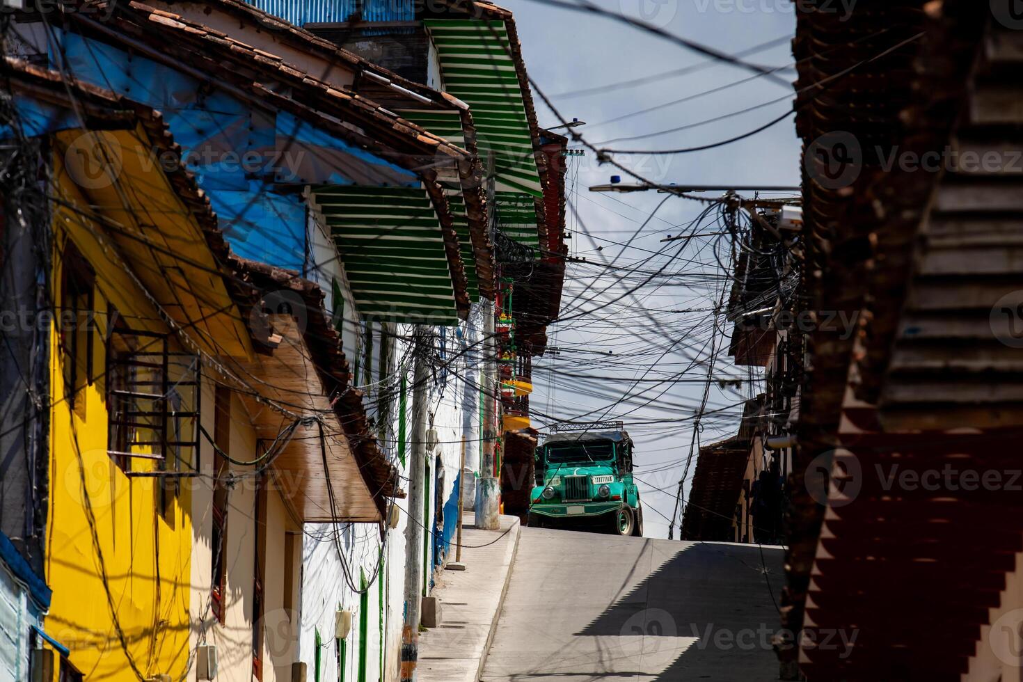 Traditional yipao at the heritage town of Salamina located at the Caldas department in Colombia. Tangle of public services cables. photo