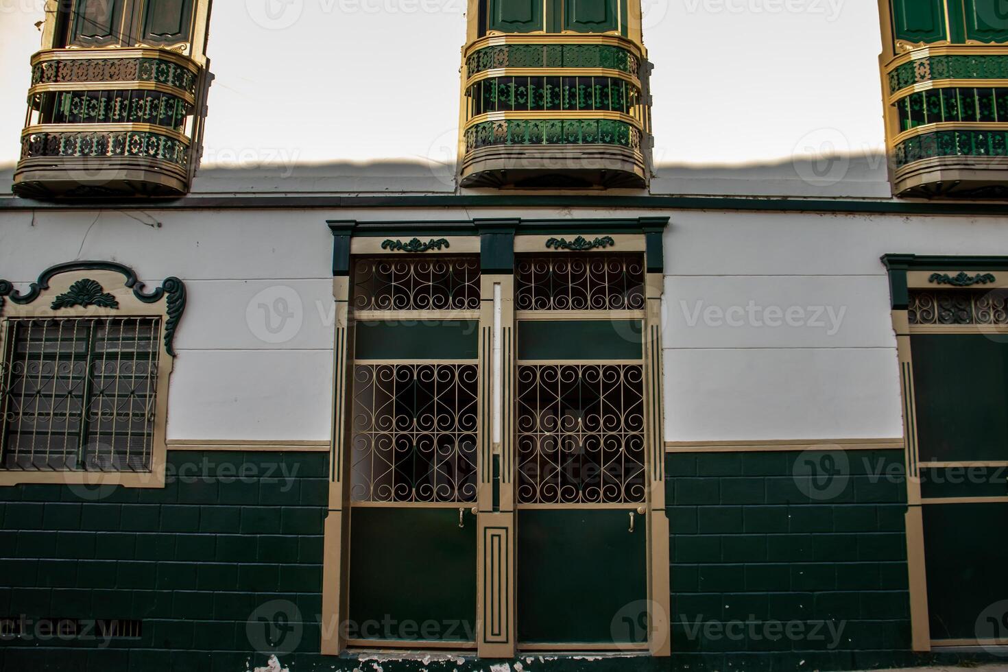 Beautiful facade of the houses at the historical downtown of the heritage town of Salamina located at the Caldas department in Colombia. photo