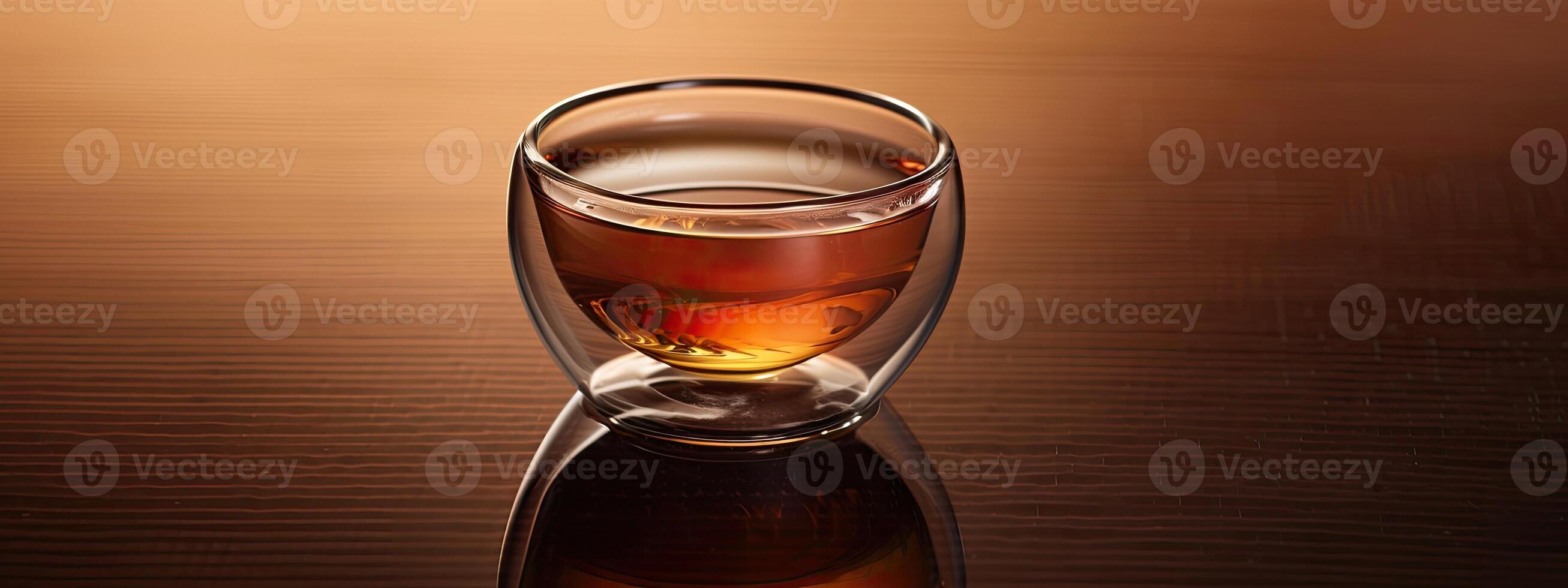 Coffee in Glass Cup on Wet Surface photo