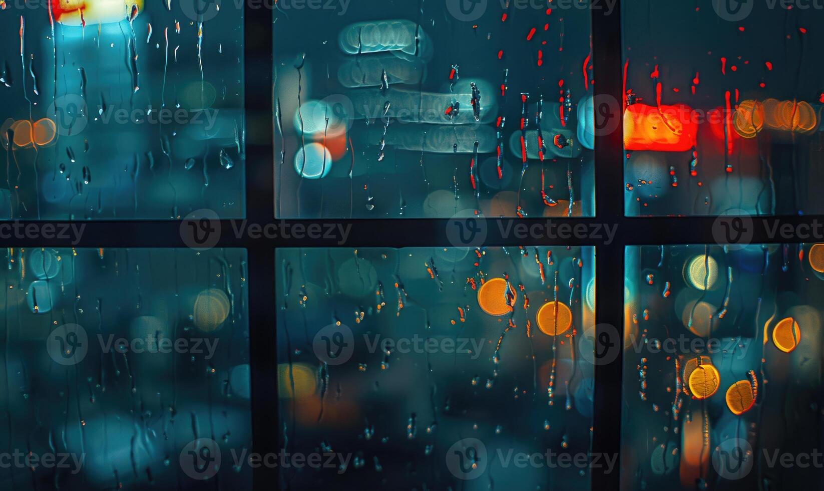 A rain-soaked windowpane with blurred city lights in the background photo