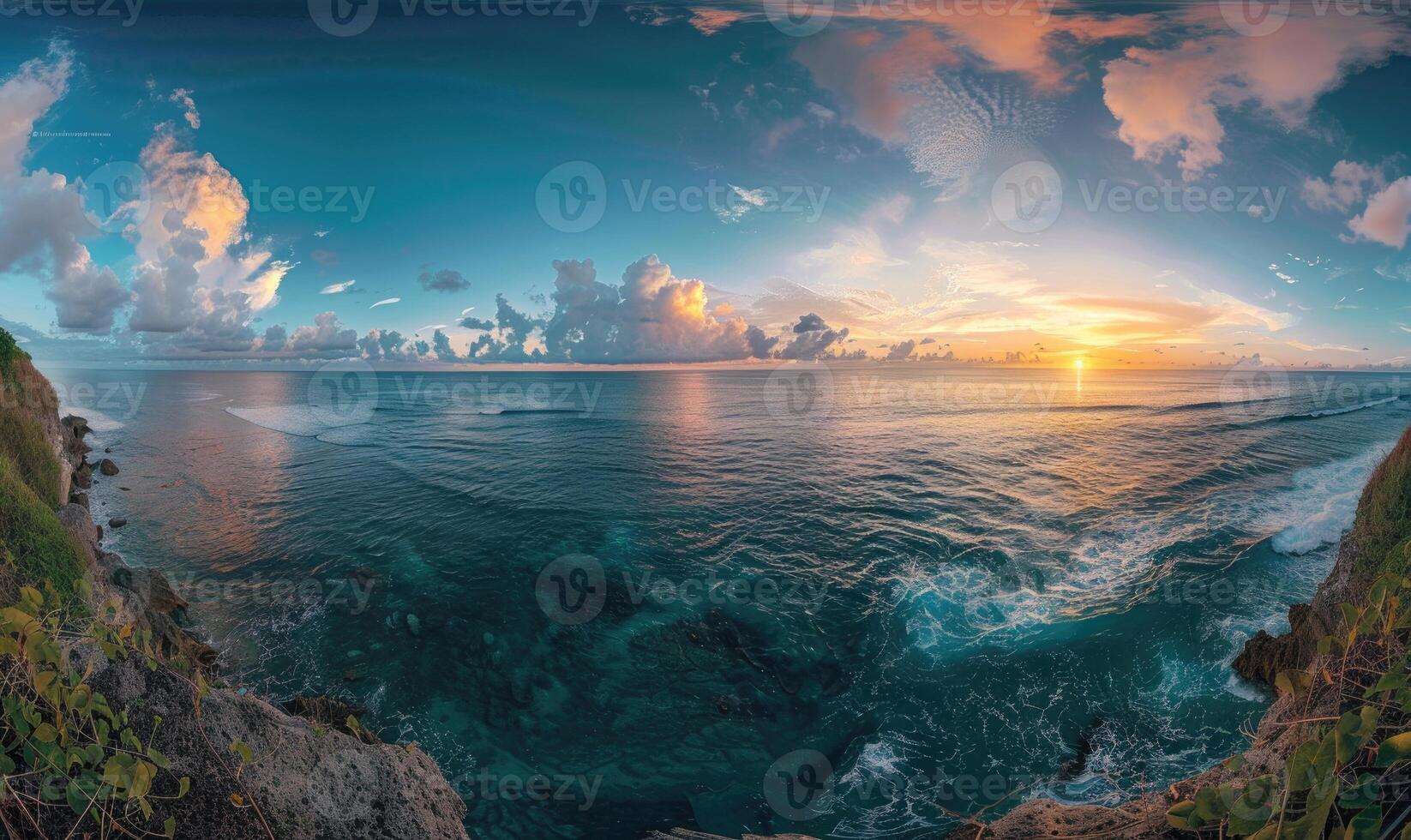 A panoramic view of the ocean at sunset photo