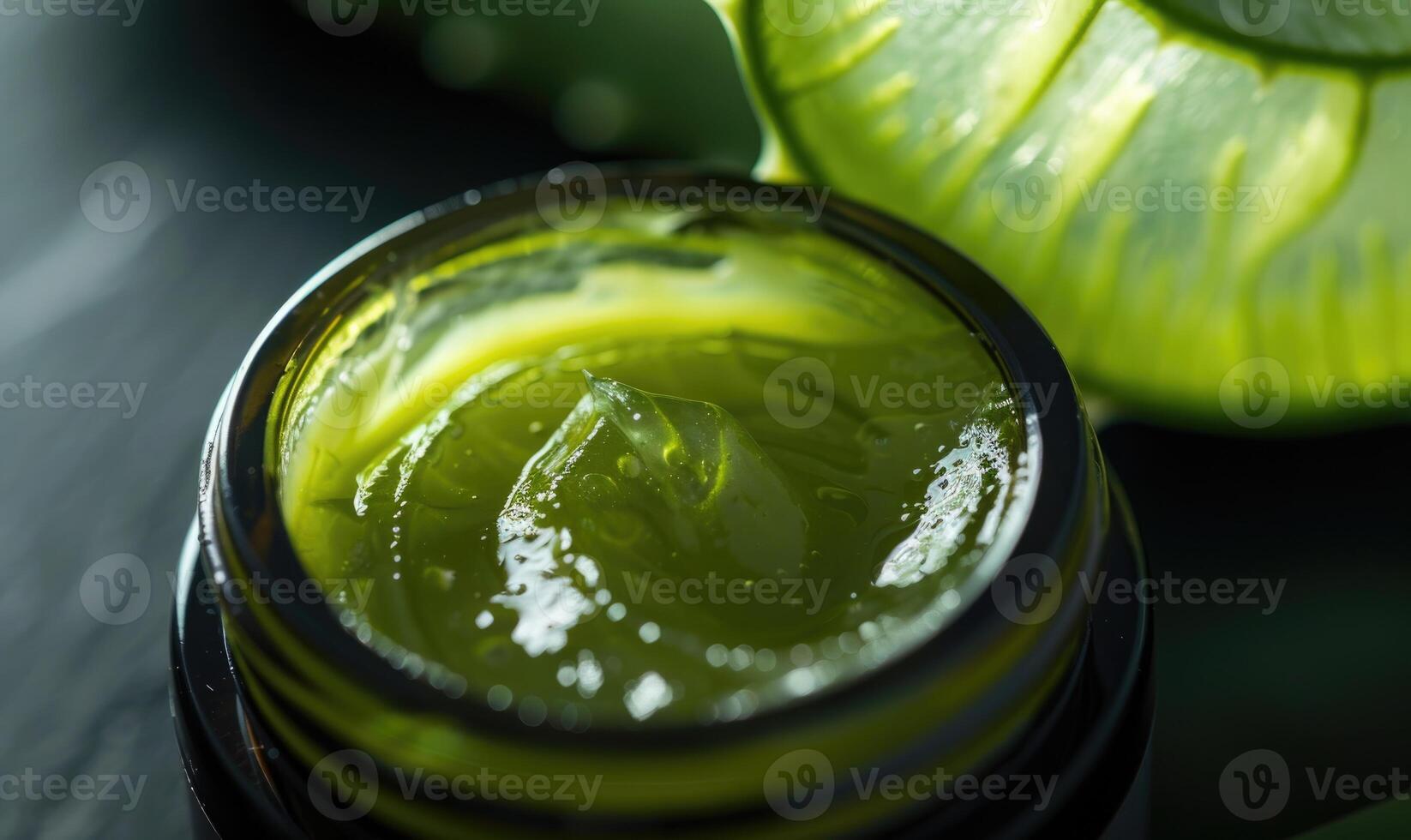 Close-up of a blank jar mockup filled with aloe vera face cream, skin care routine photo