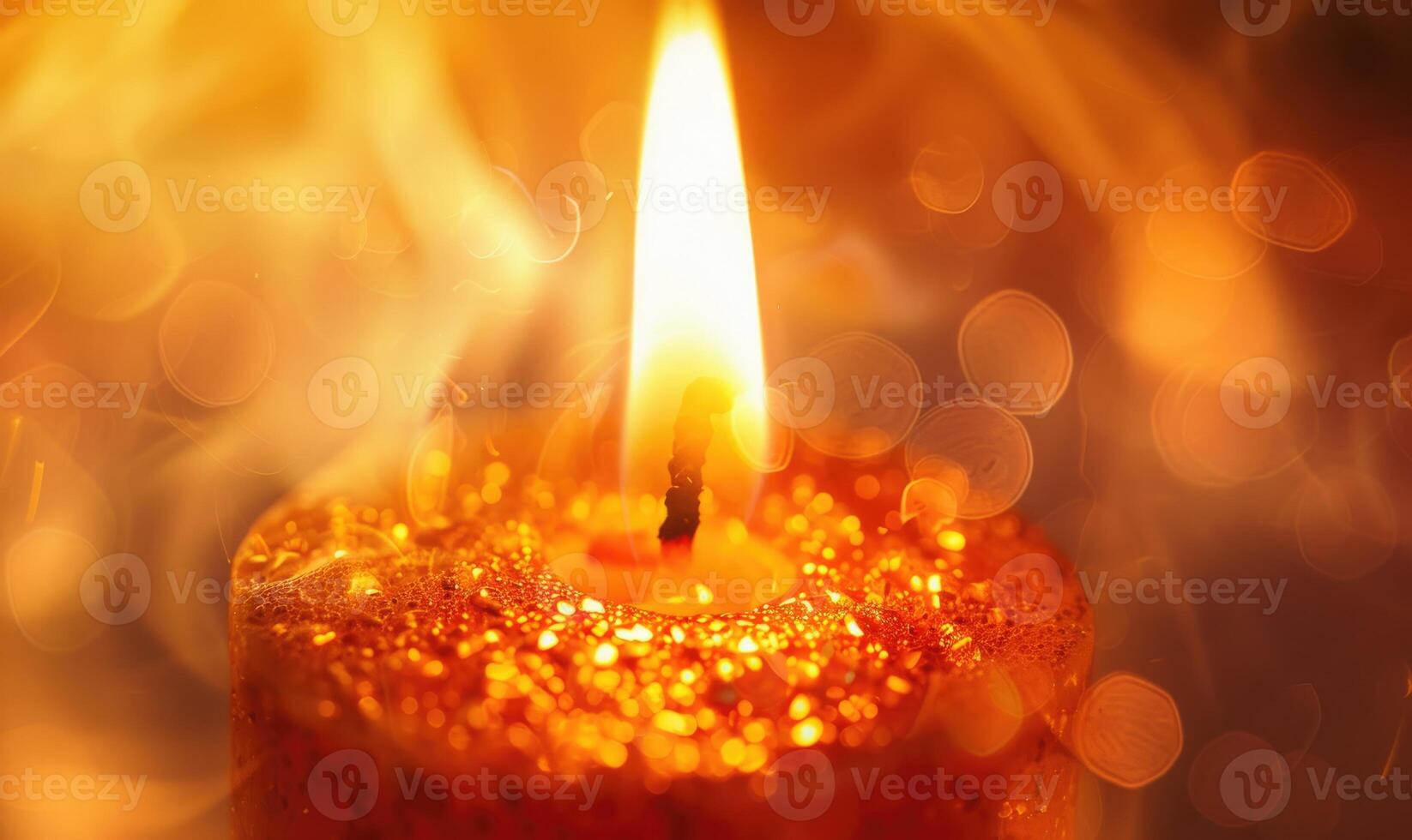 Close-up of a candlewick engulfed in flames photo