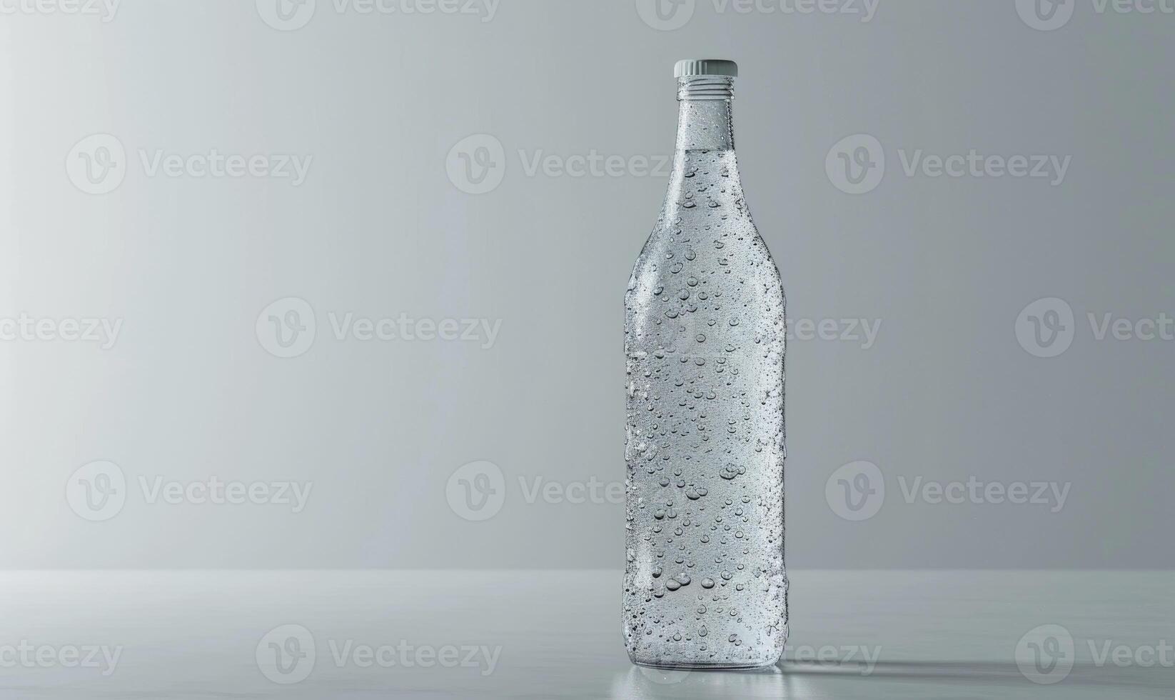 Studio shot of a crystal clear glass bottle mockup showcasing a premium quality mineral water, with droplets condensing on the surface photo