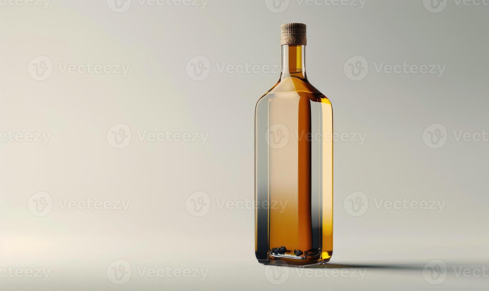 Studio shot of an amber glass bottle mockup filled with rich and aromatic cold-pressed olive oil photo