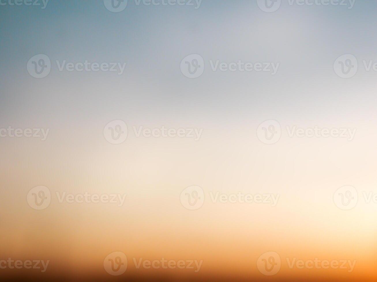 Spectacular sunset over, orange sun rising up over the horizon photo