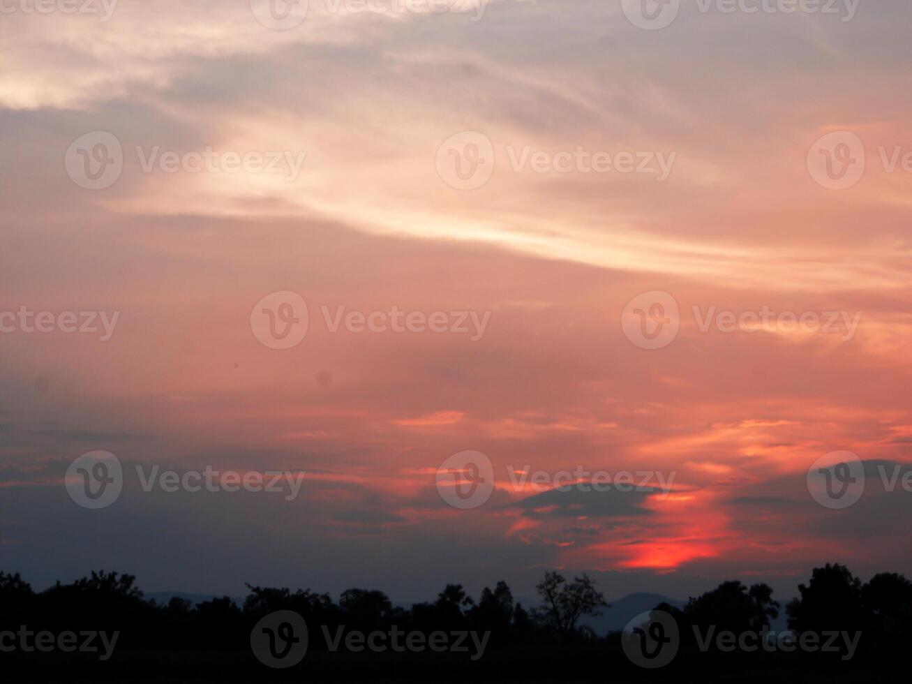 orange at sunset, beautiful with clouds photo