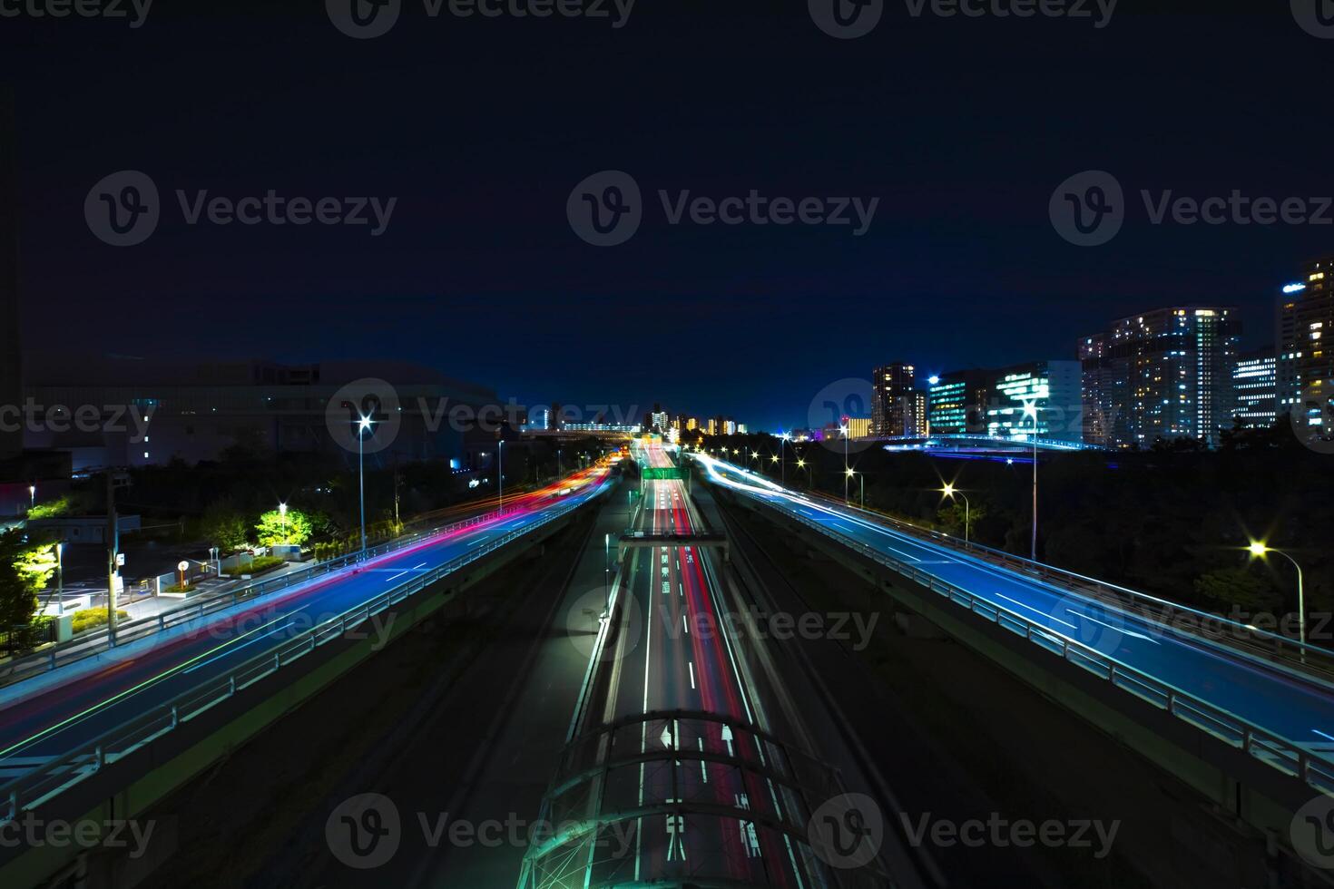 A night traffic jam at the urban street in Tokyo wide shot photo