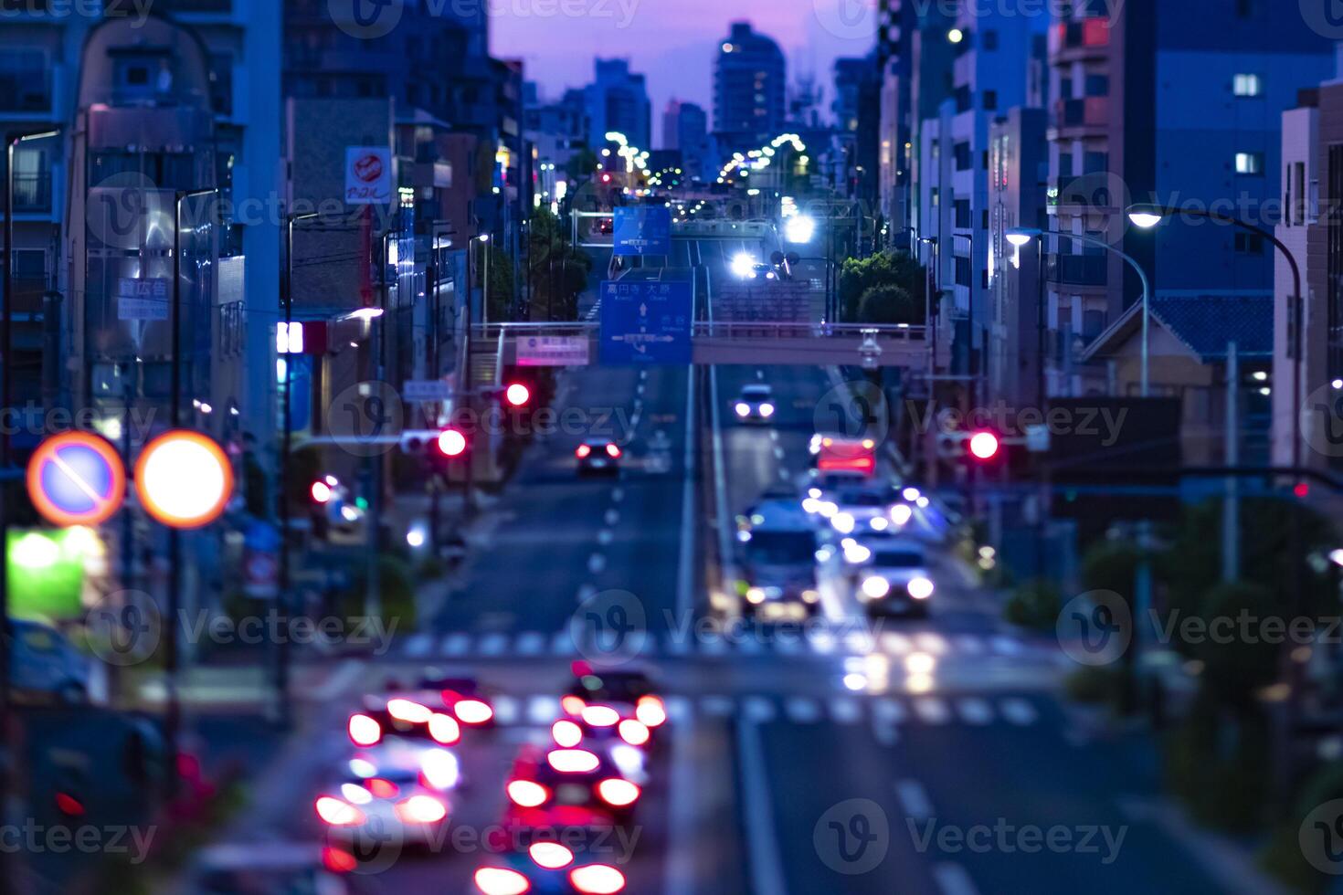 A miniature traffic jam at the street in Setagaya Tokyo at dusk. photo