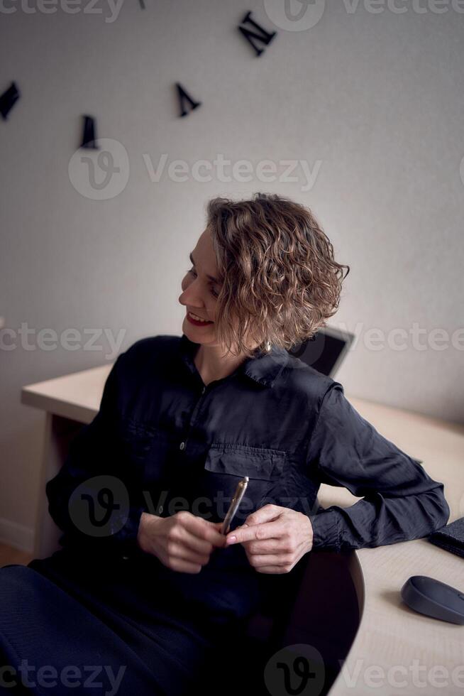 woman with laptop work in office photo