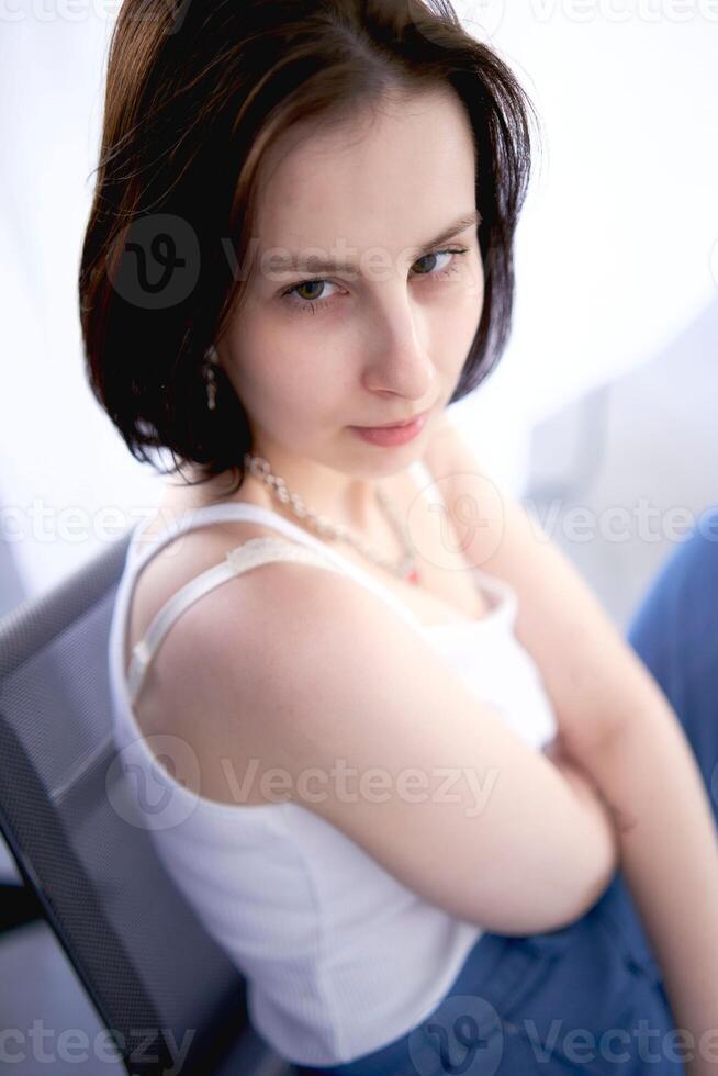 close up portrait of a young teenage girl fighting brain cancer at a studio photo shoot