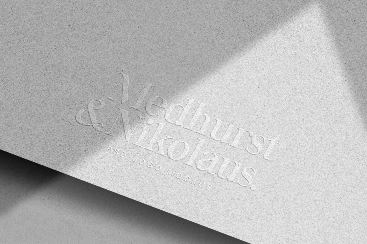 Embossed logo mockup on white paper psd