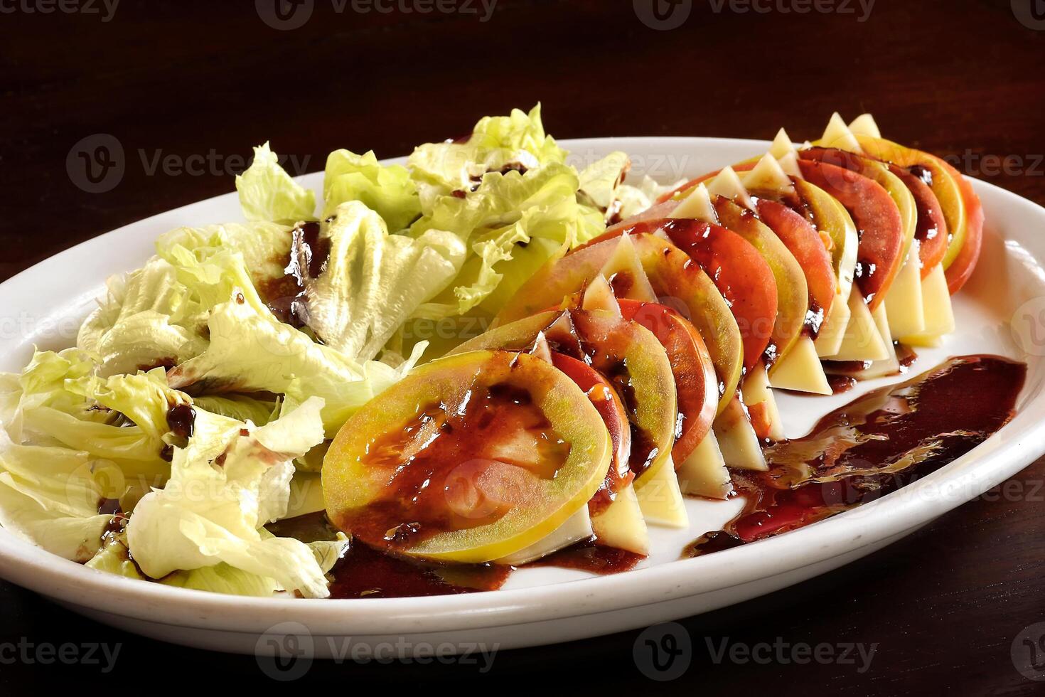 lettuce and tomato salad with raspberry jam photo