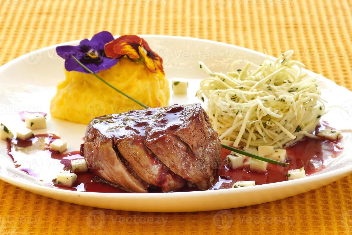 grilled tall fillet with cassava puree and grape jelly sauce photo