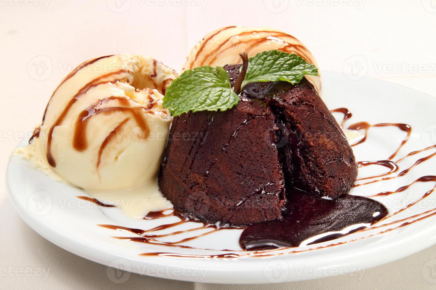Petit Gateau, classic French chocolate dessert with cream ice cream photo