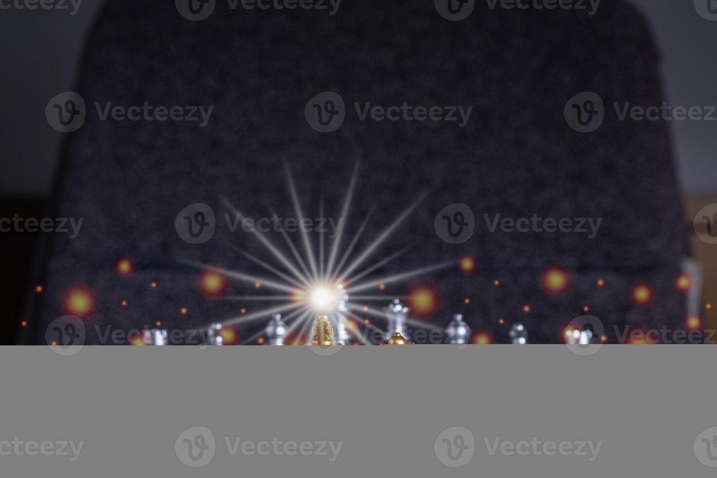 Front view of a chess game on a chessboard with lighting and blur background. Business game competitive strategy. Concept of strategy for business photo