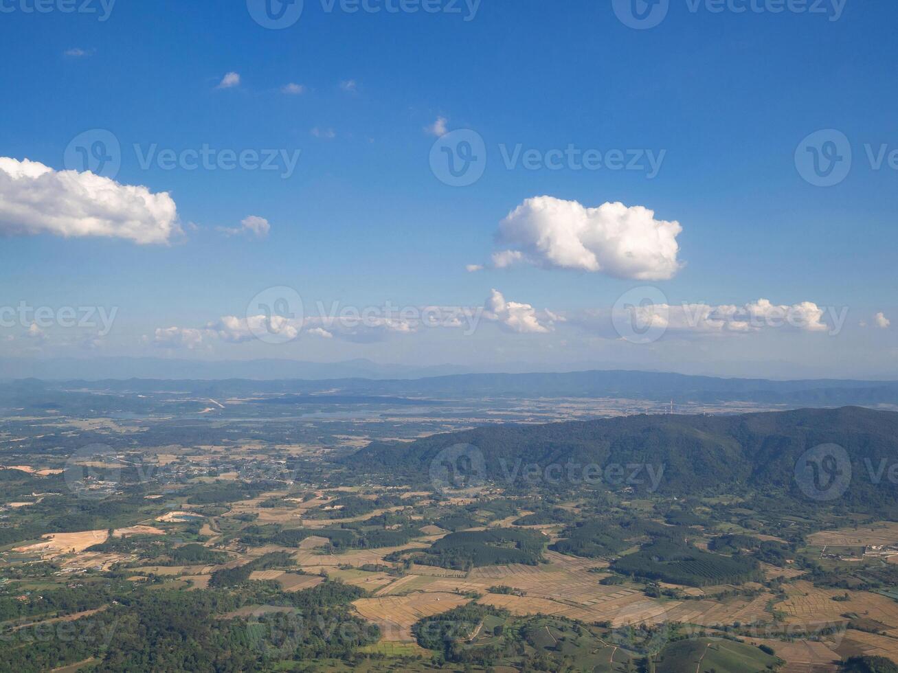 Beautiful landscape with mountains covered with green forest. Bird's-eye view. Space for text photo