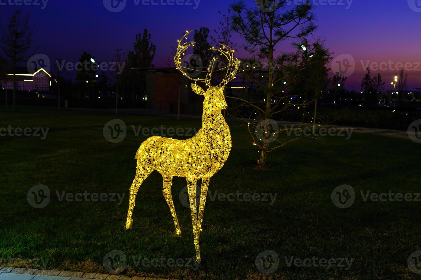 A luminous christmas deer from garlands. photo