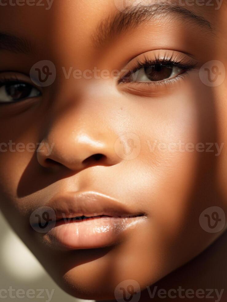 Portrait of a young black woman with skin details close-up. Natural beauty of a cute model. Advertising of cosmetics, perfumes photo