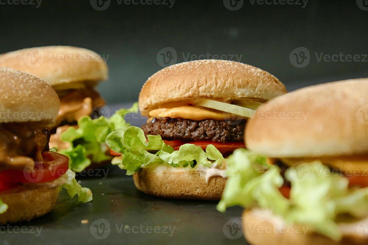 Group of Hamburgers Arranged on Table photo