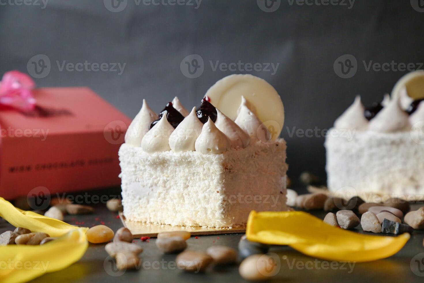 Delicious Cake on Wooden Table photo