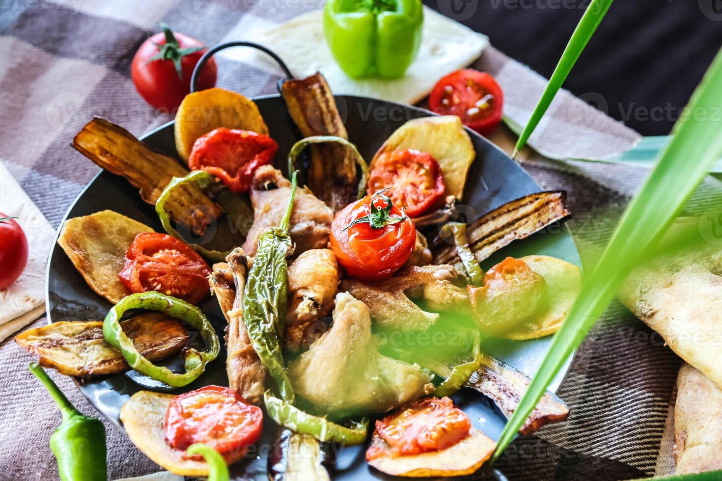 Deliciously Prepared Plate of Food on a Wooden Table photo