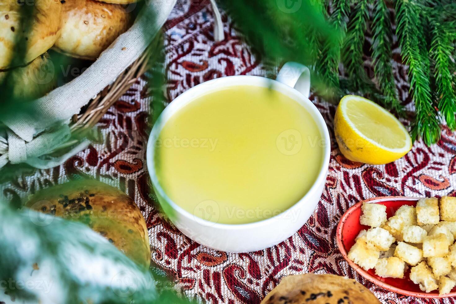 Bowl of Soup and Plate of Pasta photo