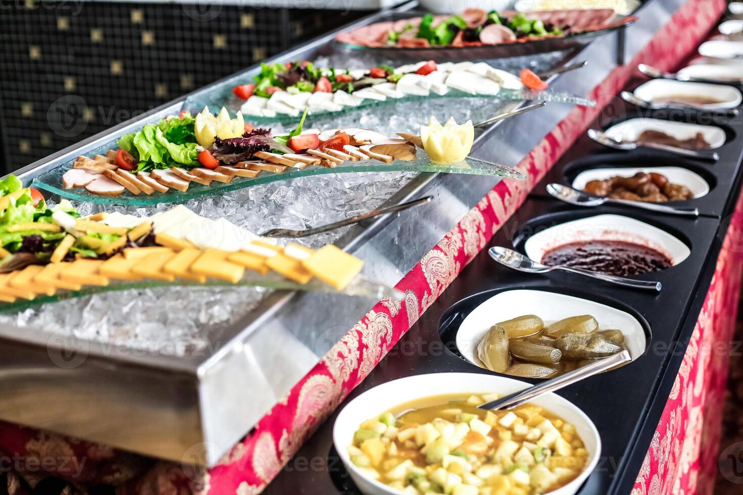 Varied Buffet Line Featuring an Assortment of Delicious Food Options photo