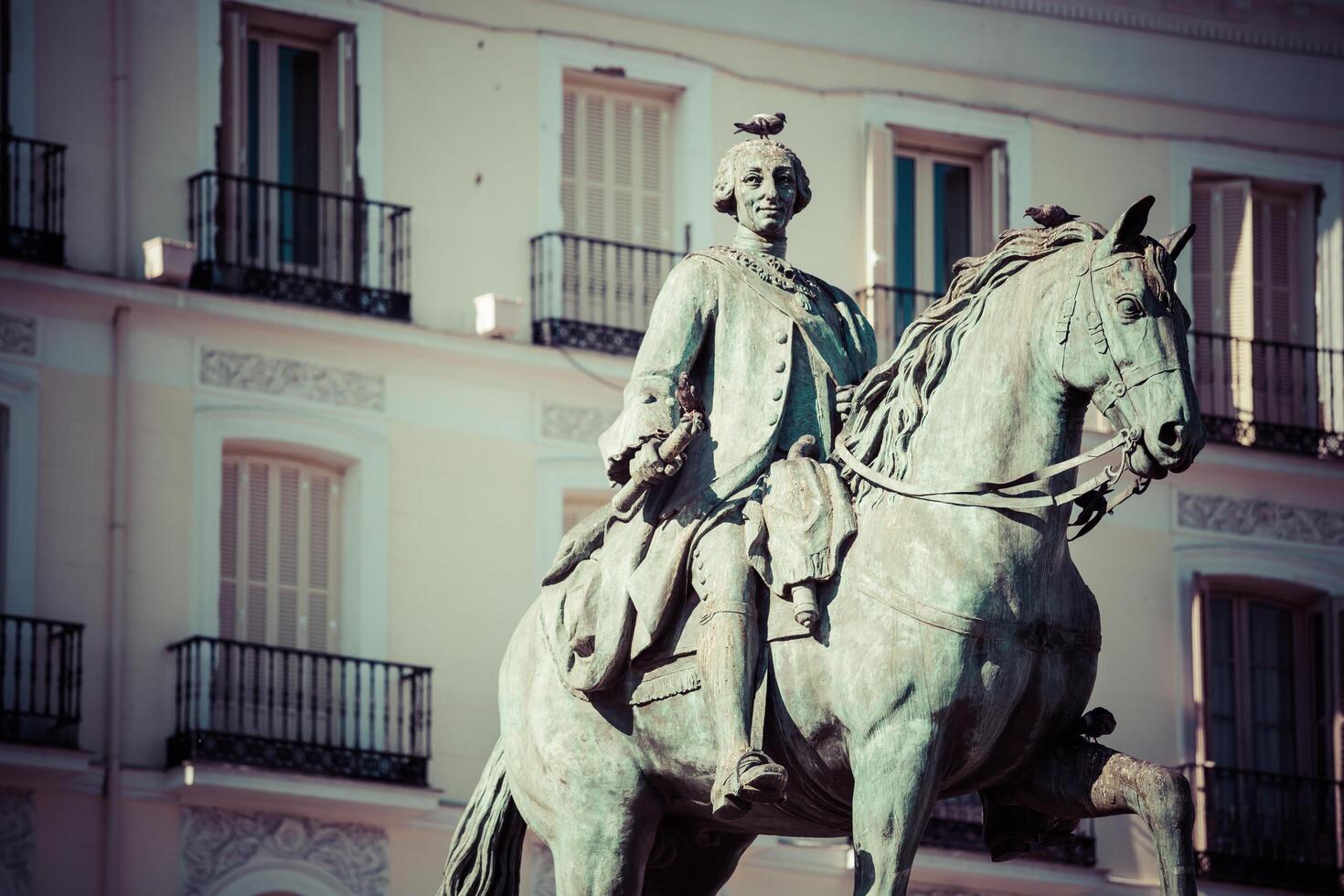 King Carlos III Equestrian Statue Famous Tio Pepe Sign Puerta del Sol Gate of the Sun Most Famous Square in Madrid Spain photo