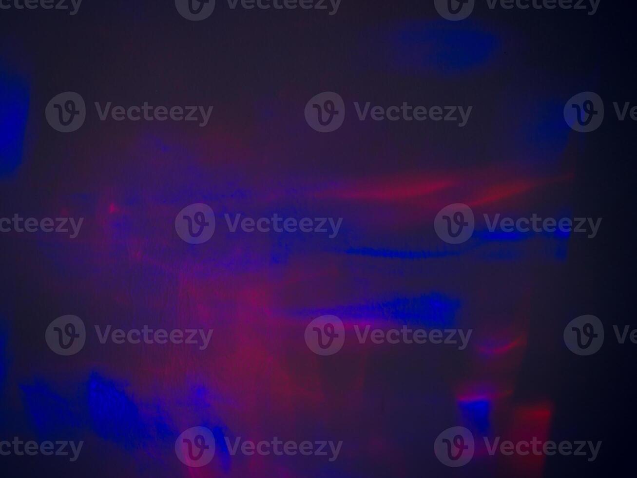 Light reflections at night on the wall in the dark for a party. photo